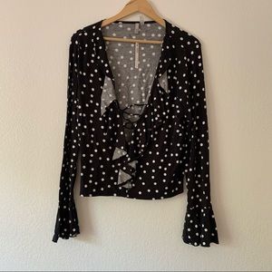 Polka dot long sleeve lace up top